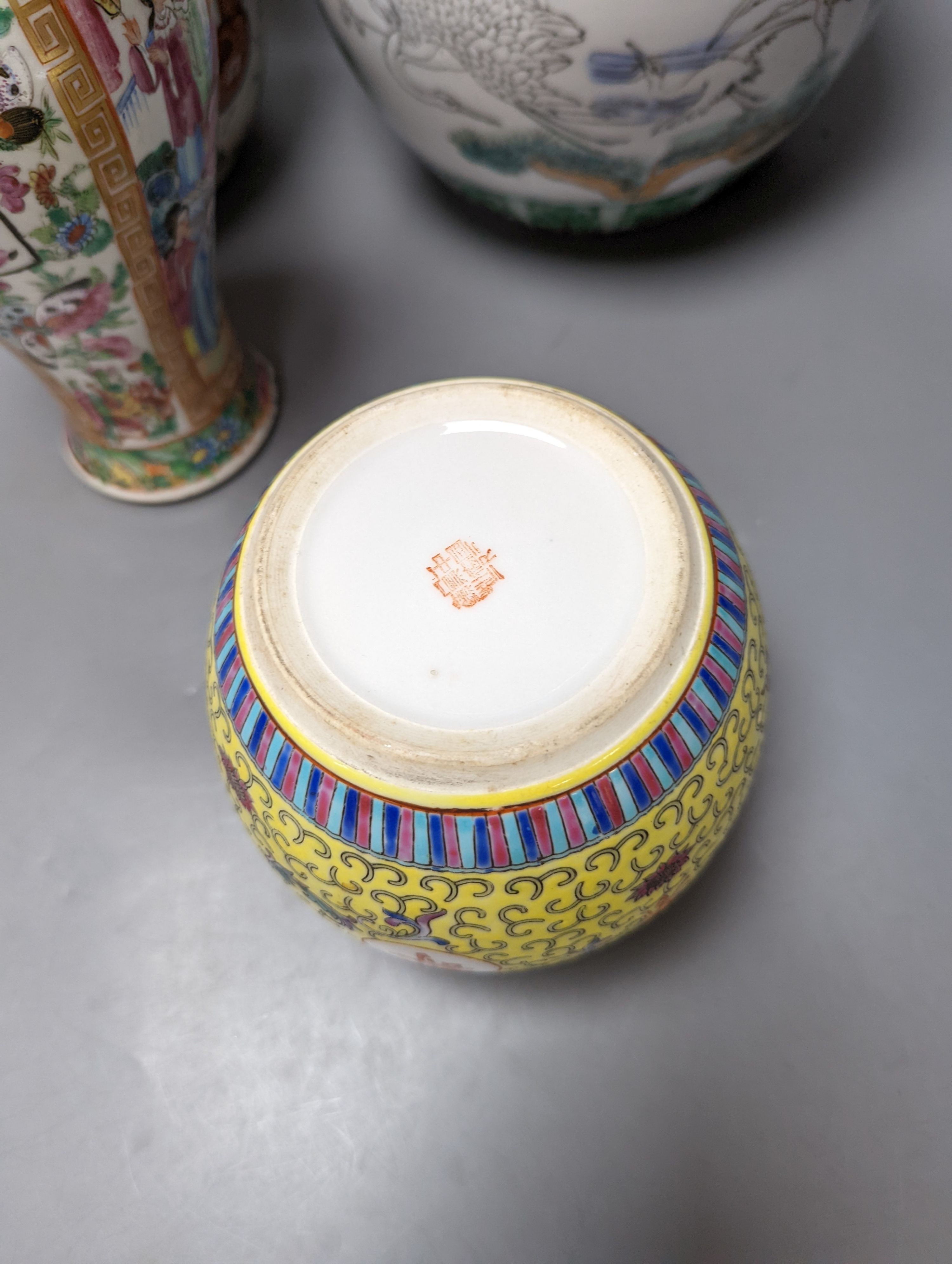 A Chinese famille rose vase and two ginger jars, together with a Japanese vase, 38cm